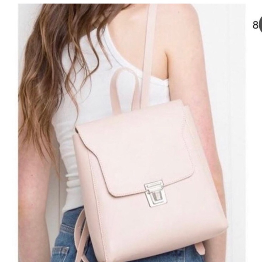 Never used, brand new condition! Amazing quality like real leather! Super cute!